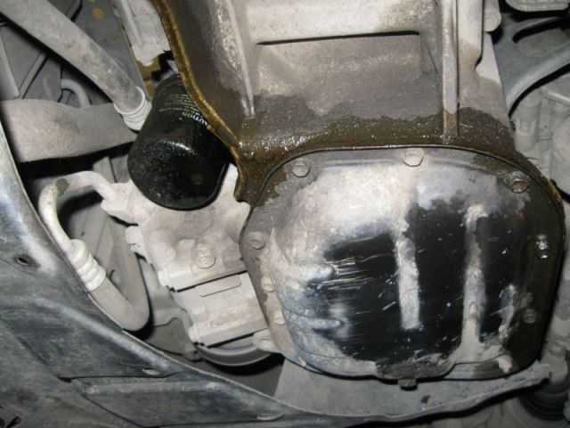Капает масло из под машины причины. течет масло из двигателя. протечка под маслофильтром